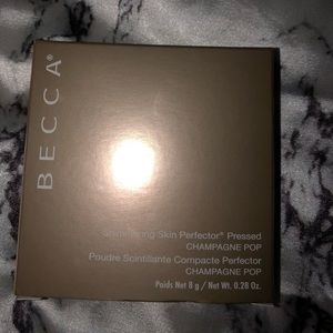 BECCA highlighter in shade champagne pop!